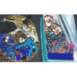 Two boxes of various costume jewellery