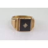 9ct gold, onyx and diamond ring