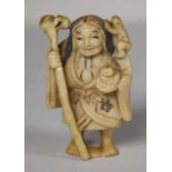 Antique Japanese ivory netsuke - Man & Staff