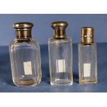 Two various silver capped perfume bottles