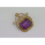 Test gold fob with facetted amethyst