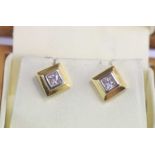 Boxed 18ct two tone gold and diamond studs