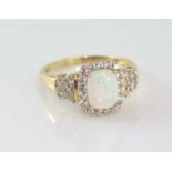 10ct yellow gold, opal and cz ring