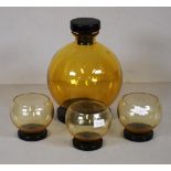 Four piece art deco amber glass set