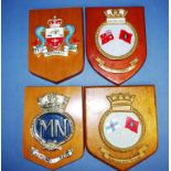 Four mounted shipping plaques