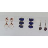 Three various pairs of silver stone set earrings