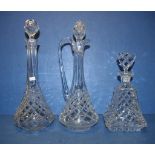 Three various cut crystal decanters