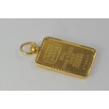 Gold pendant marked 20g 999.9 gold