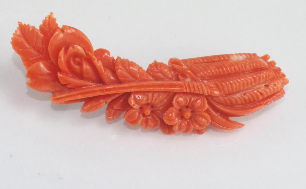 Carved coral flower and leaf brooch