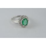 Silver and emerald ring