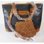 Ladies Oroton black and tan leather handbag