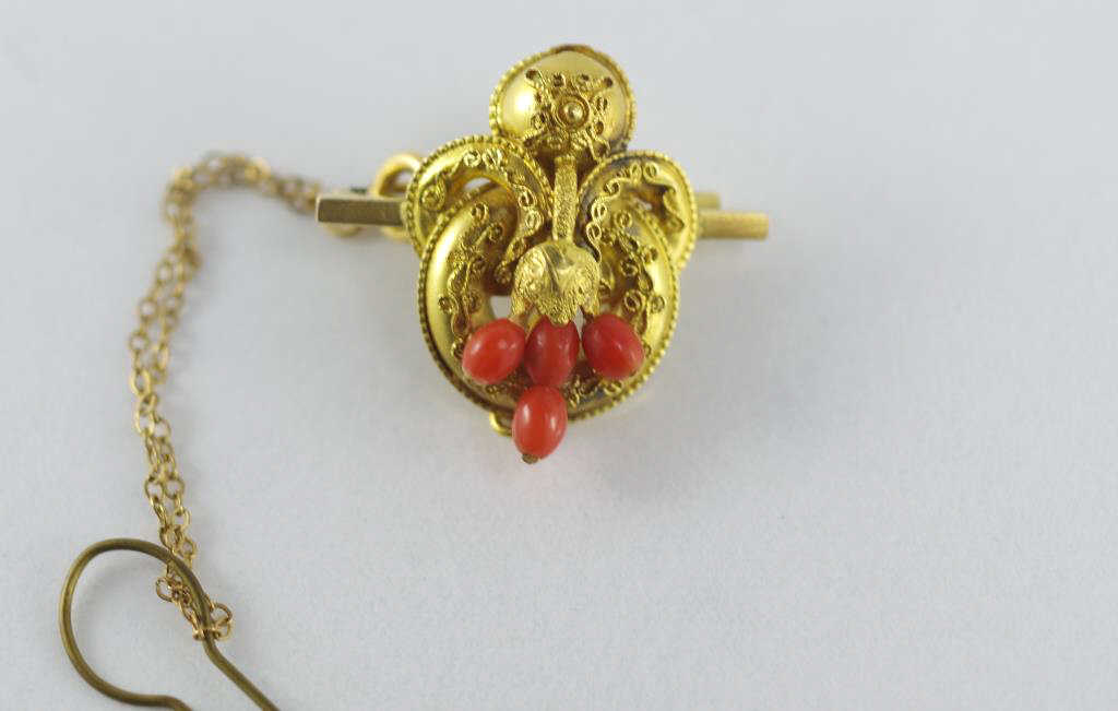 Delicate antique gold and coral brooch