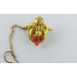 Delicate antique gold and coral brooch