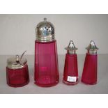Four various Edwardian ruby red glass tableware