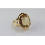 A good yellow gold and citrine ring