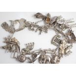Silver charm bracelet with charms