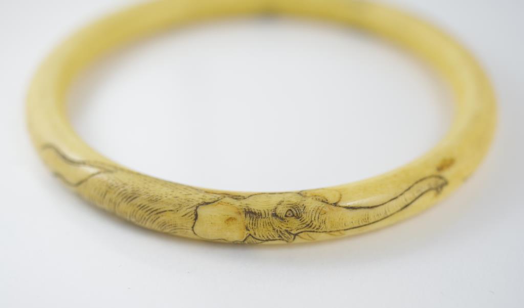 A good antique Chinese ivory bangle