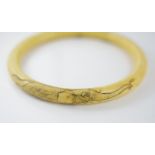 A good antique Chinese ivory bangle
