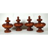 Four large German black forest furniture finials