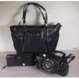 Two black ladies handbags and a purse