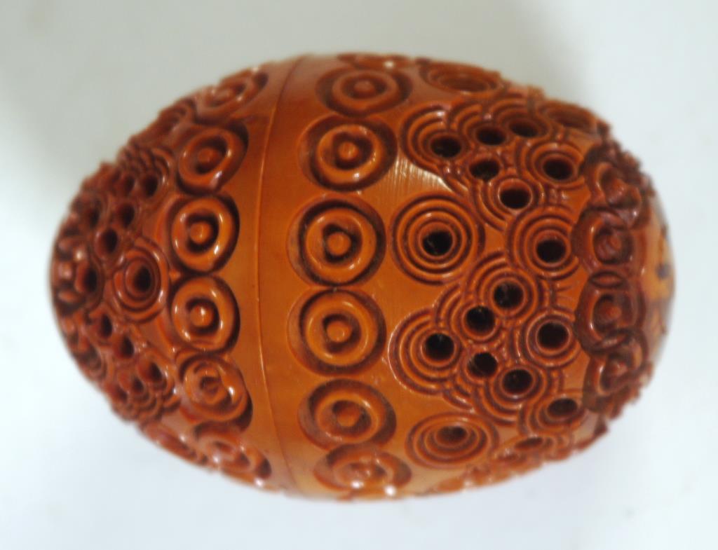 Victorian carved Coquilla nut egg thimble case