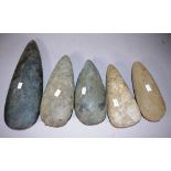 Five various Papua New Guinea stone axe heads