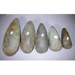 Five various Papua New Guinea stone axe heads