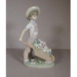 Lladro boy with wheelbarrow figure