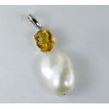 A baroque pearl and citrine pendant