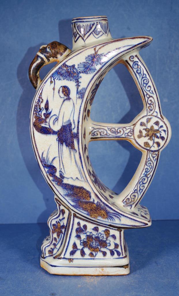 Large oriental blue & white crescent vase