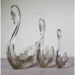 Three graduated Whitefriars art glass swan figures