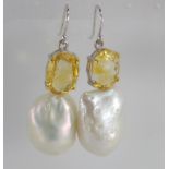A pair of baroque pearl and citrine earrings