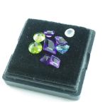 Various unset gemstones and paste