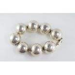 A Mexican Taxco large silver ball bracelet