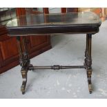 Victorian ebonised games table