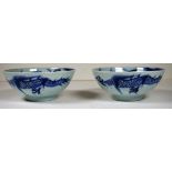 Pair of Chinese Qing blue & white dragon bowls