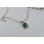 A silver and green tourmaline pendant