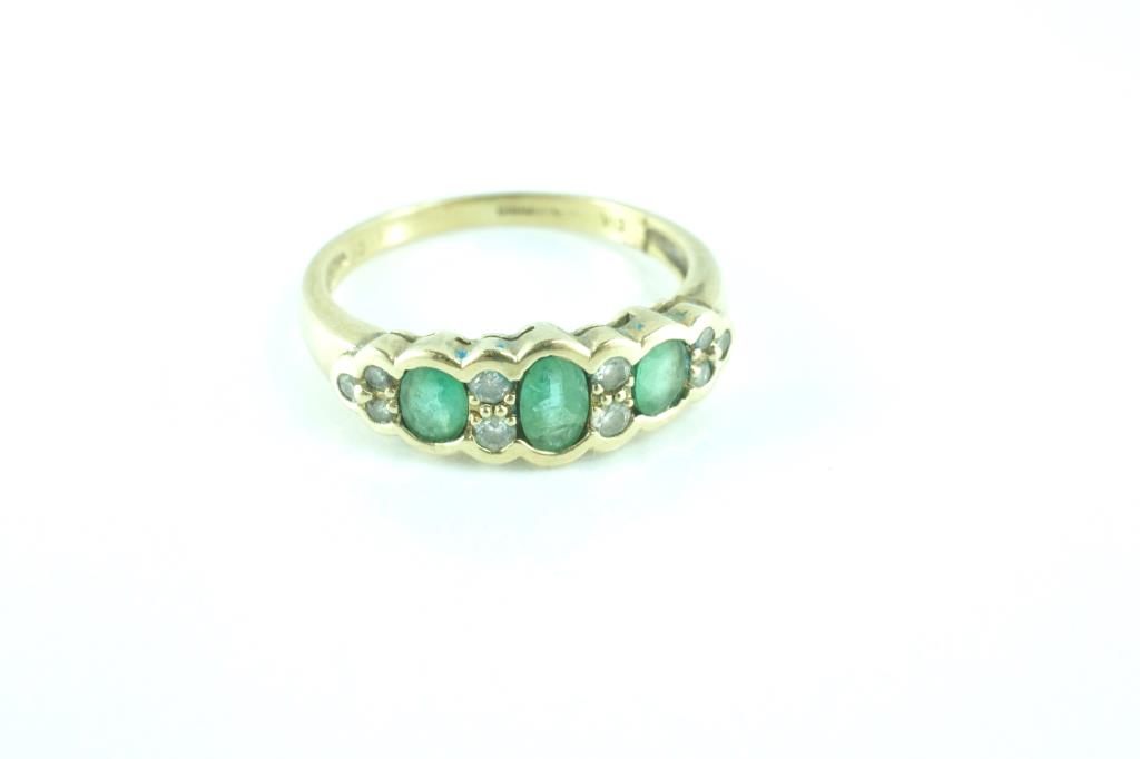 Yellow gold, emerald and diamond ring