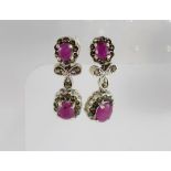A pair of silver, marcasite and ruby drop earrings