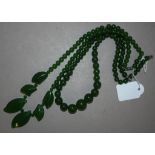 Two various Eastern greenstone necklaces