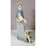Lladro standing woman with goose figure