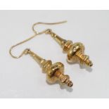 A pair of antique French gold earrings