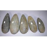 Five various Papua New Guinea stone axe heads