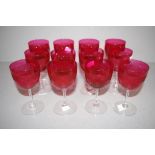 Twelve Victorian ruby red cut wine glasses