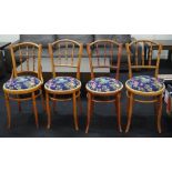 Four antique bentwood spindle back chairs
