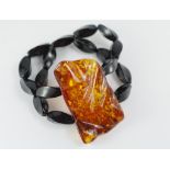 A stretch onyx and Baltic amber bracelet