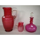 Three various ruby red glass items
