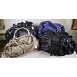Four various ladies handbags