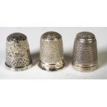 Two Sterling silver sewing thimbles