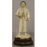 Antique oriental carved ivory figure